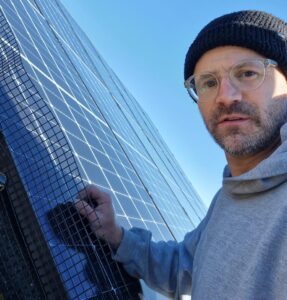 Able Electric installer fitting solar panels for a Midlands solar PV installation